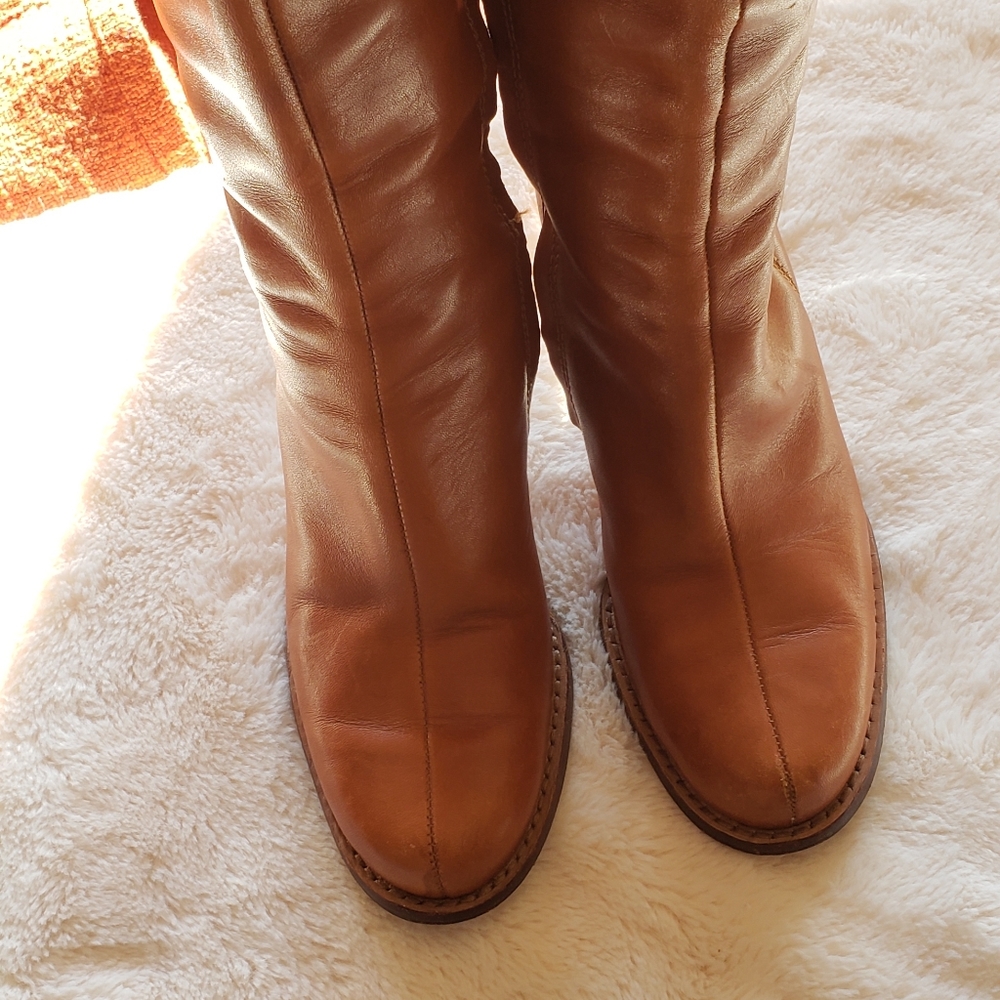 Calf length leather boots